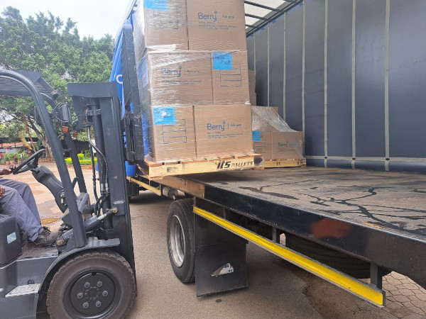 2 Berry Astrapak MARCOM Forklift Busy Loading Pallets Size